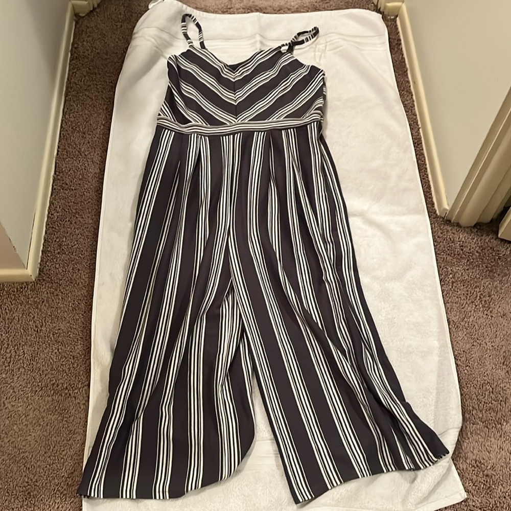 Grey with white stripes and worn just a couple times